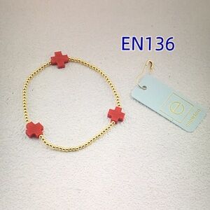 Newton Gold Bracelet with Red Cross Accents
